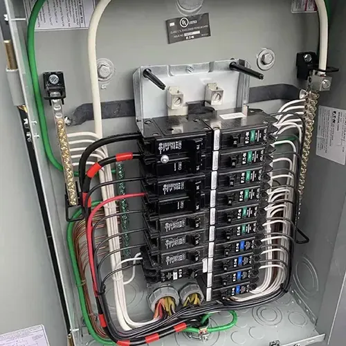 Rows of breakers neatly wired into an open electrical panel